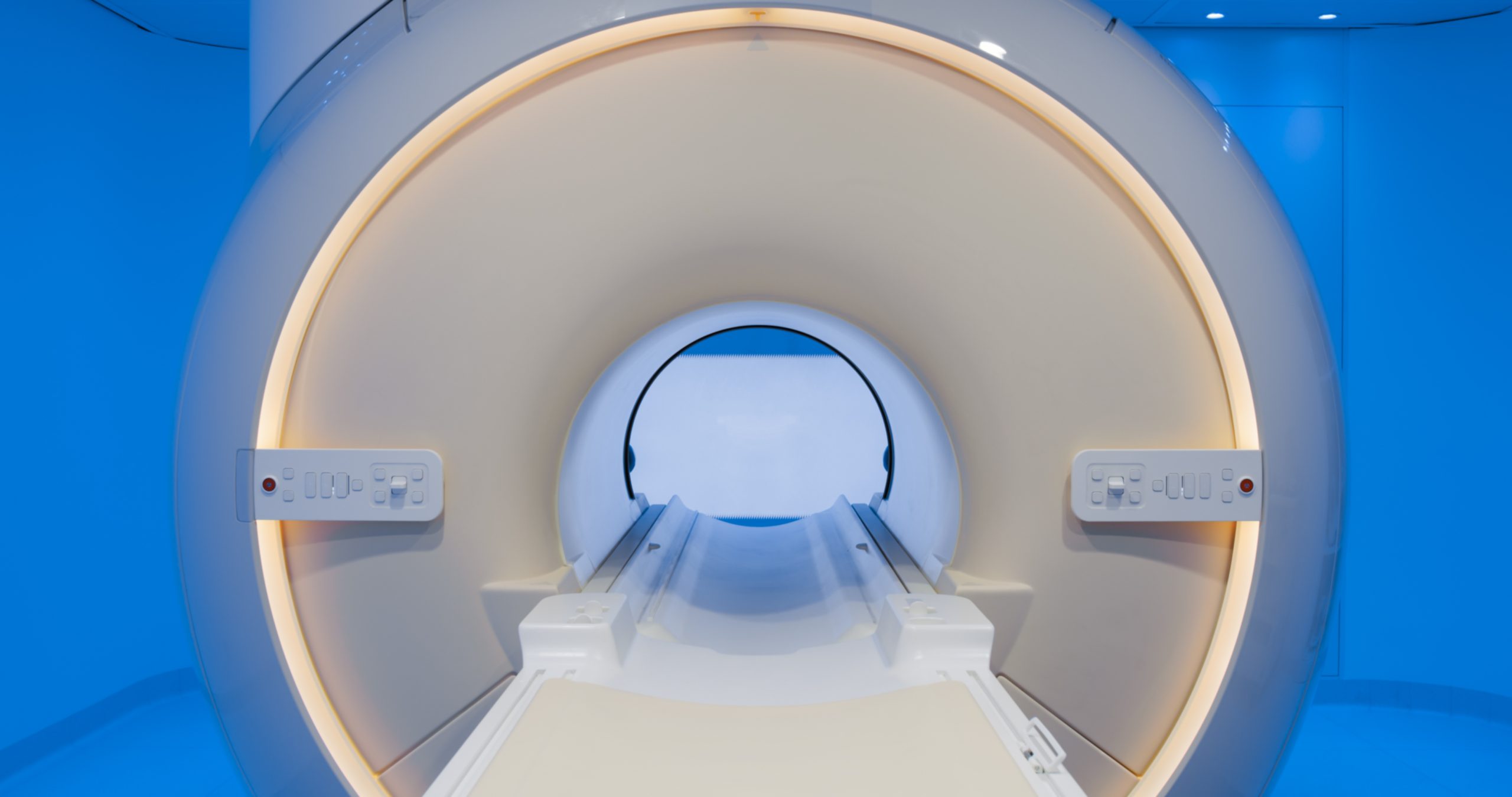 Close-up of MRI scanner in examination room at the hospital.